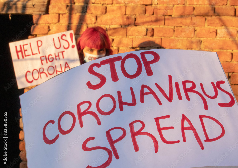 STOP CORONA SPRED Banner. Young people protest for Corona virus. Coronavirus pandemic global panic.