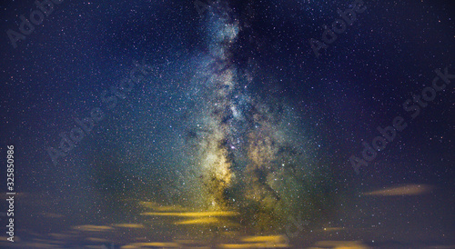 Clouds streak across the Milky Way