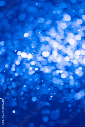 Blue glitter bokeh of light.Abstract blurred light
