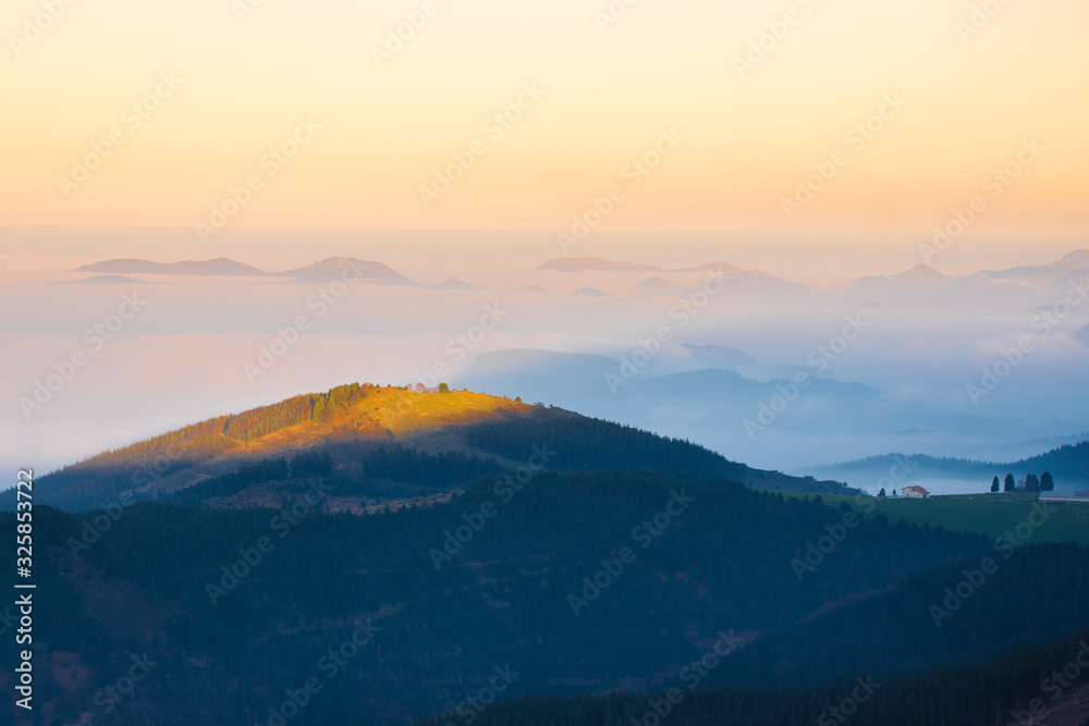 sunset in the basque country mountains, spain