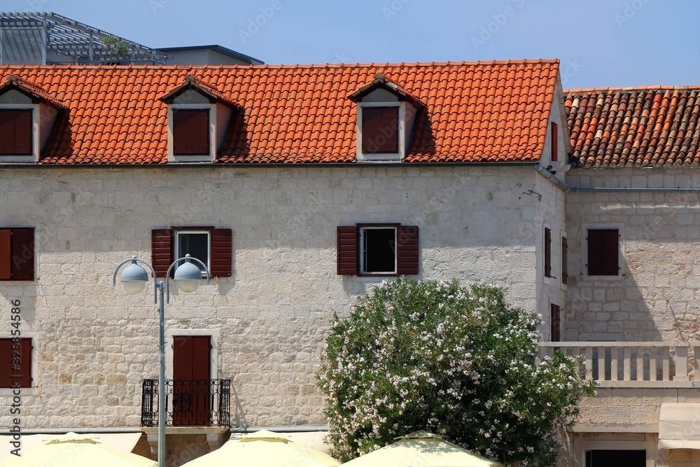 Traditional Mediterranean architecture in small town Supetar, on island Brac, Croatia.