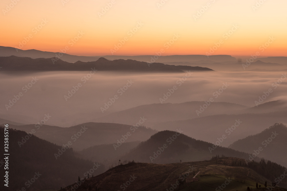 sunset over the mountains in the basque country, spain sunset over the mountains in the basque country, spain