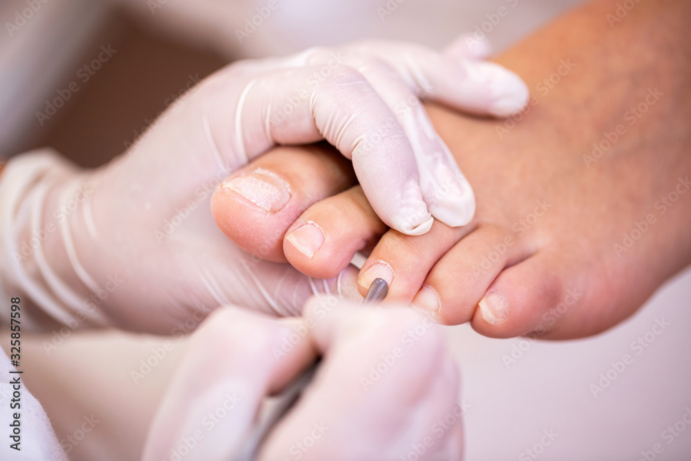 Close up of nail surface cleaning Close up of nail surface cleaning