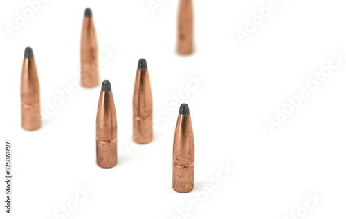 A rifle bullet. Hunting ammunition isolated on white.