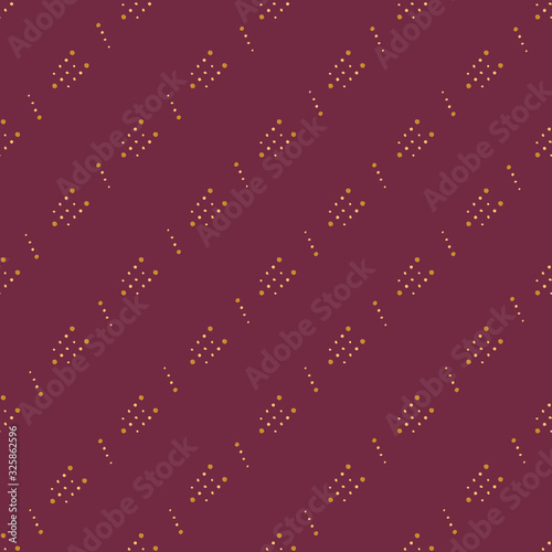 Seamless spotted diagonal geometric yellow-gold patterns on a berry color background. Design for wallpaper, textile, poster, decoration, fabric, wrapping paper