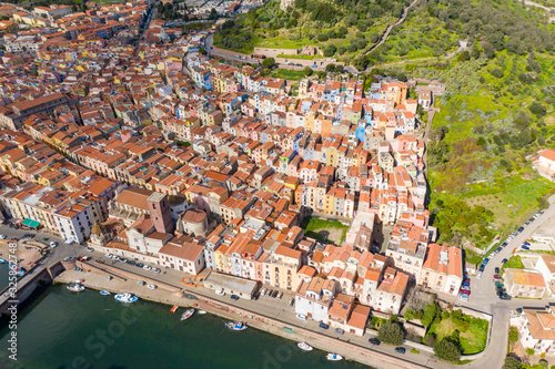 aerial view of bosa town with his colored houses and the castle in background