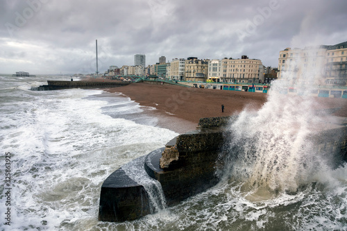 wave breaking on Brighton groyne during a storm photo