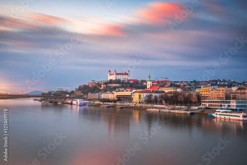 Cityscape of Bratislava, Slovakia at Sunset as Seen from a Bridge over Danube River Towards Old Town of Bratislava.