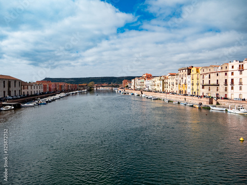 aerial view of bosa town with his colored houses and the castle in background