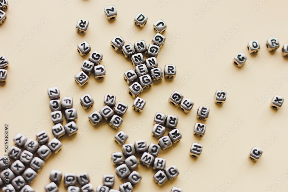 Abstract background with letter cubes. Empty space for text. Abstract background with letter cubes. Empty space for text.