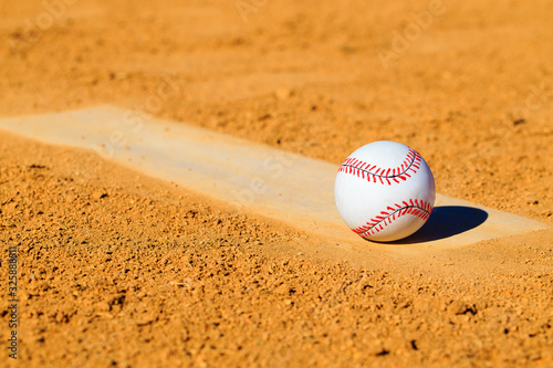 Photography Baseball or Softball on Dirt Mound
