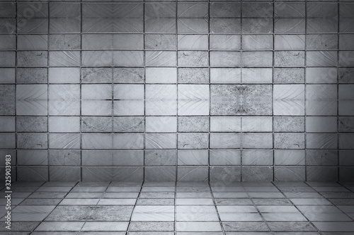 Texture dark concentrate floor with brick wall 