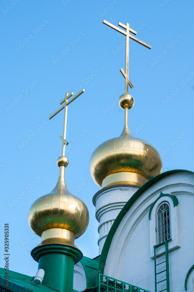 Russia, Blagoveshchensk, July 2019: Domes Of the Cathedral of the Annunciation of the blessed virgin Mary of Blagoveshchensk in summer