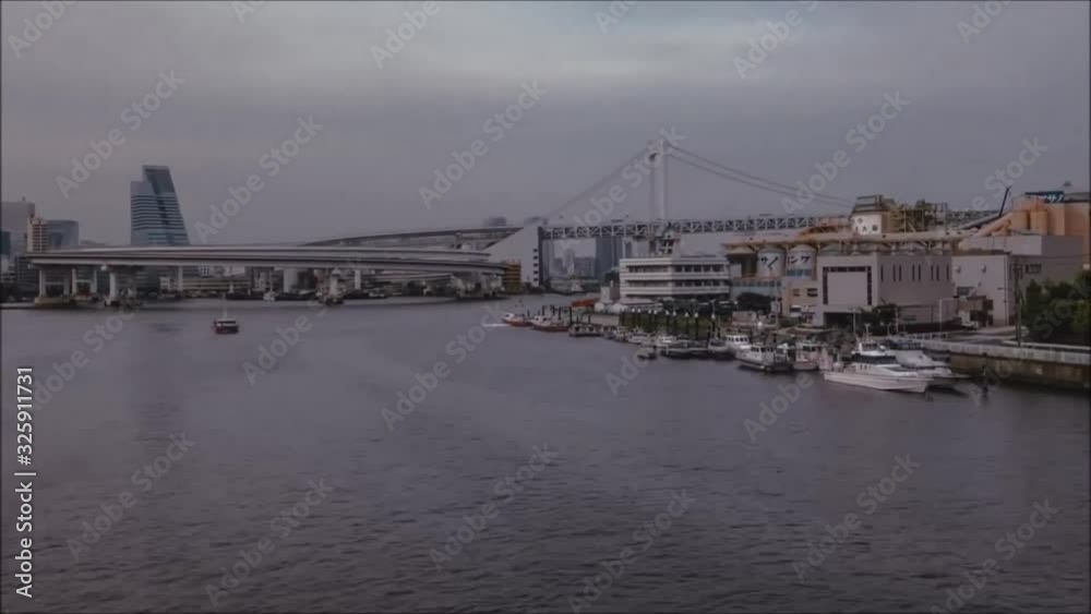 Amazing aerial steady time lapse panorama view on big city modern urban container ship port delivery harbor Tokyo Japan Amazing aerial steady time lapse panorama view on big city modern urban container ship port delivery harbor Tokyo Japan