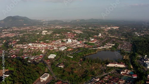 4k Aerial morning view town of Kulim, Kedah, Malaysia. The Kulim District is a district and town in the state of Kedah, Malaysia. It is located on the southeast of Kedah, bordering Penang.  photo