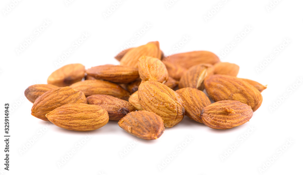 Closeup of almonds an isolated on the white background, clipping path Closeup of almonds an isolated on the white background, clipping path
