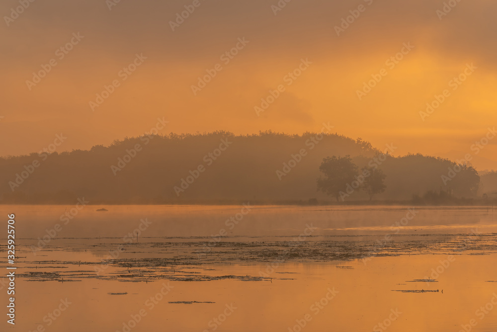 Morning nature scene, sky, clouds and fog (mist) on the lake Morning nature scene, sky, clouds and fog (mist) on the lake