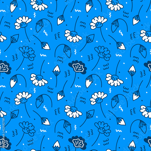 Seamless pattern with hand drawn colorful doodle branches, flowers and leaves. Vector texture for textile, fabric, paper. Flat hand drawn plants. Vector Summer floristic background on blue