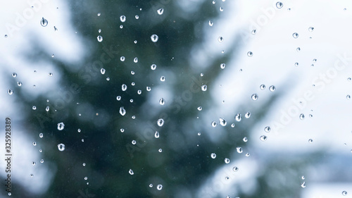 Abstract background with drops on the glass