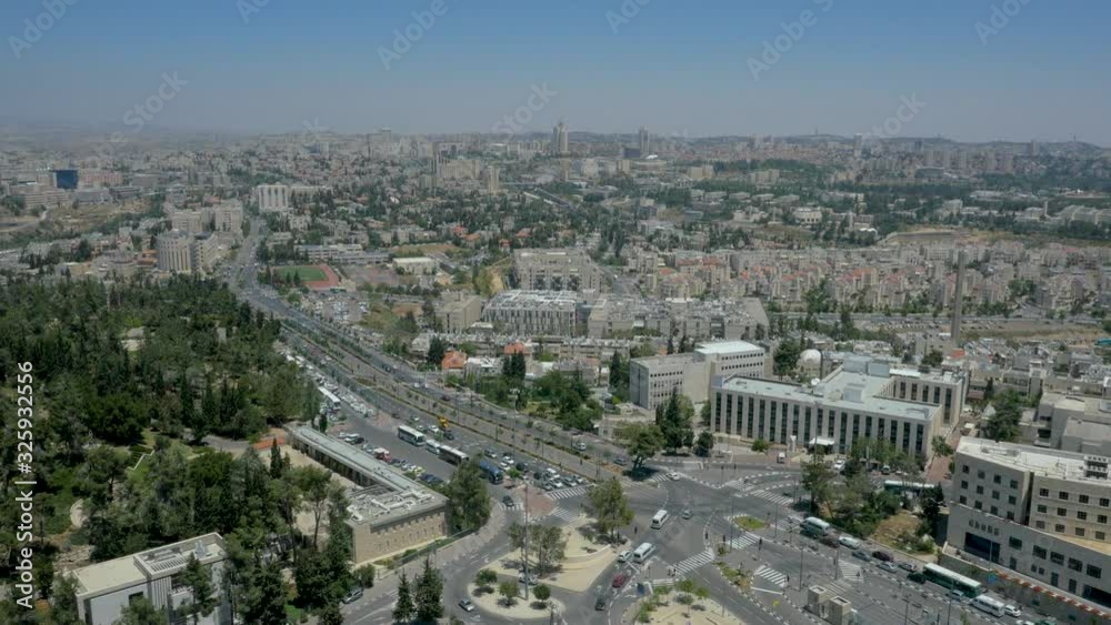 Jerusalem wide cityscape on a sunny day. Aerial rising Jerusalem wide cityscape on a sunny day. Aerial rising