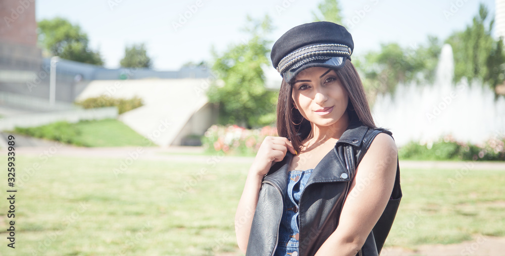 Portrait of young woman in the outdoor. Portrait of young woman in the outdoor.