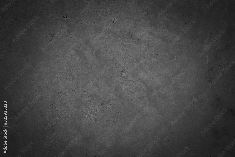Fototapeta premium Dark concrete textured wall background.black grunge cement wall texture for interior design. dark edges.copy space for add text.