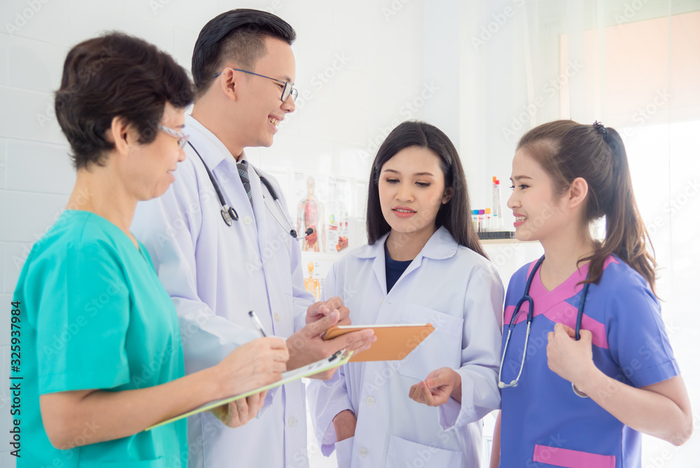 Group of asian medical team talking about patient care in conference room at hospital. Group of asian medical team talking about patient care in conference room at hospital.