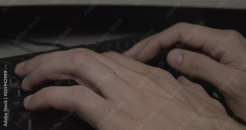 man is typing on the keyboard man is typing on the keyboard