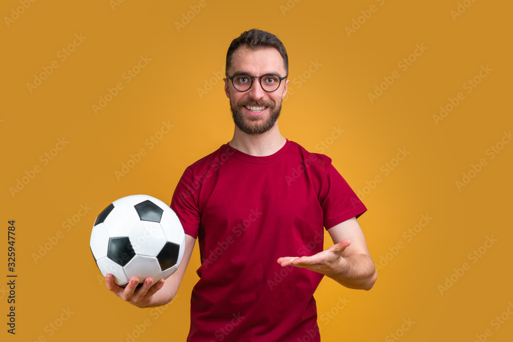 Young attractive bearded man betting at bookmaker's website Young attractive bearded man betting at bookmaker's website