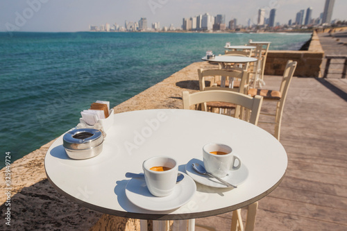 Cups of coffee on the table, on the promenade of Jaffa, Tel Aviv