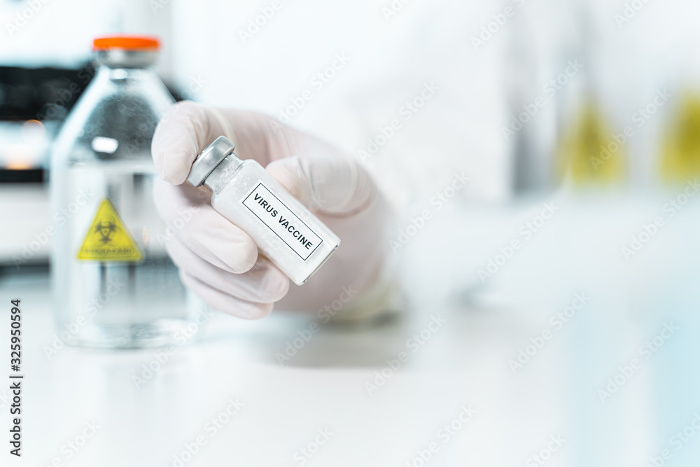 Focused photo on researcher that working in laboratory