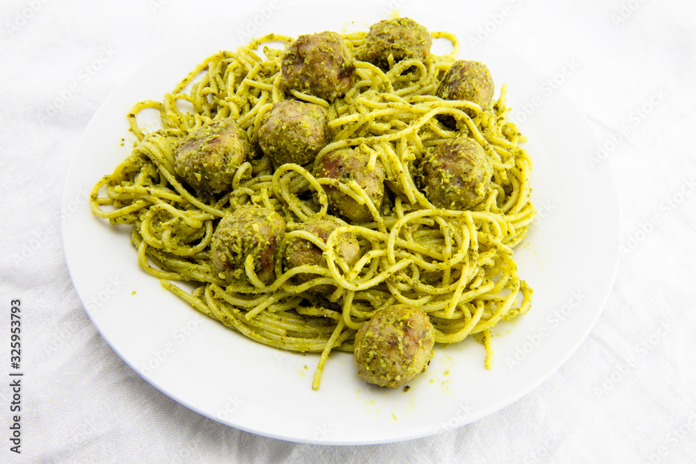 meatballs with pasta and pesto sauce
