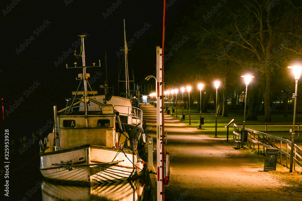 Norrtalje, Sweden Boats at night along the Norrtalje canal.