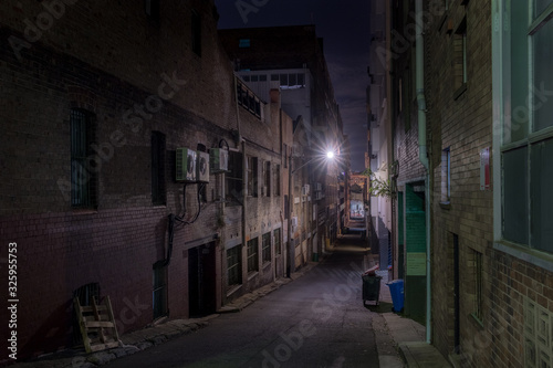 narrow street at night © Tim