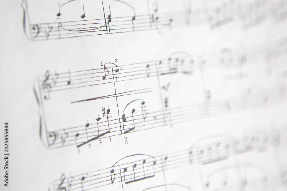 Sheet music with a number of accessories. Music note Sheet music with a number of accessories. Music note