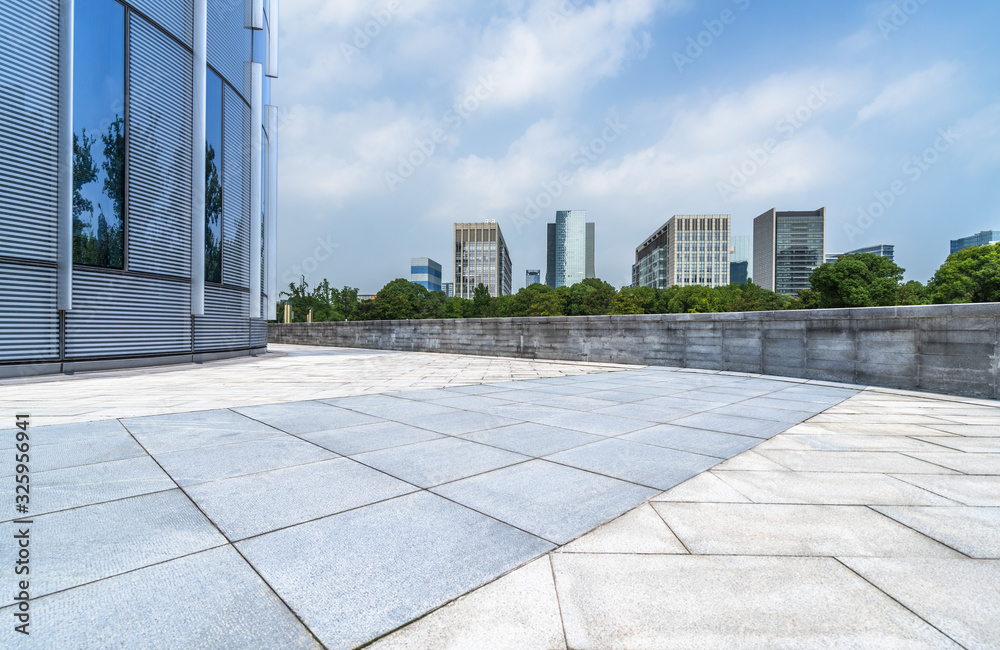 Fototapeta premium Panoramic skyline and buildings with empty square floor.