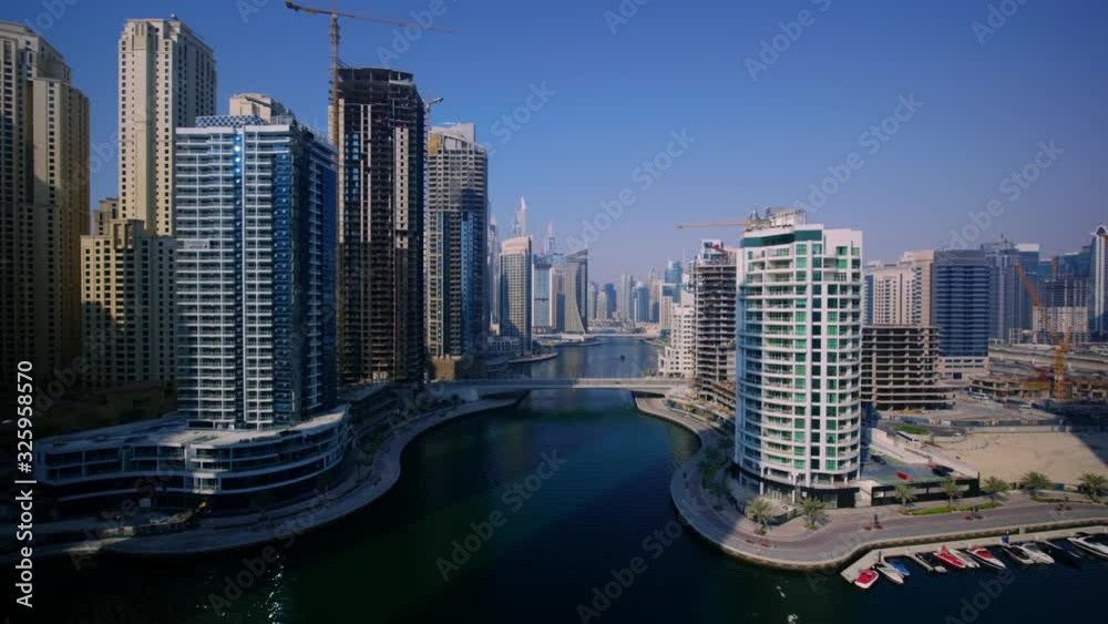 Popular modern urban skyscraper architecture of Dubai downtown cityscape in wonderful 4k aerial drone panorama flyover