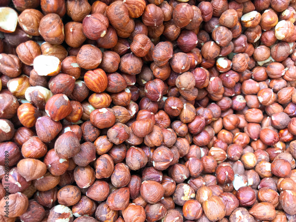 Close-Up Of Peeled Hazelnuts. Healthy Fresh Food Background. Close-Up Of Peeled Hazelnuts. Healthy Fresh Food Background.