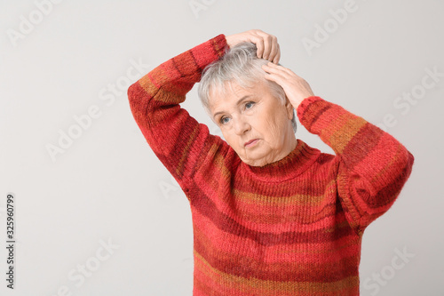 Senior woman with hair loss...