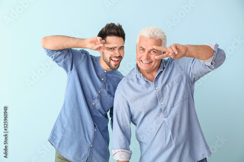Young man and his father on...