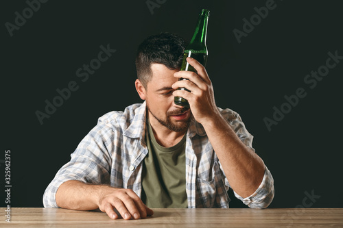 Man with alcohol addiction ...