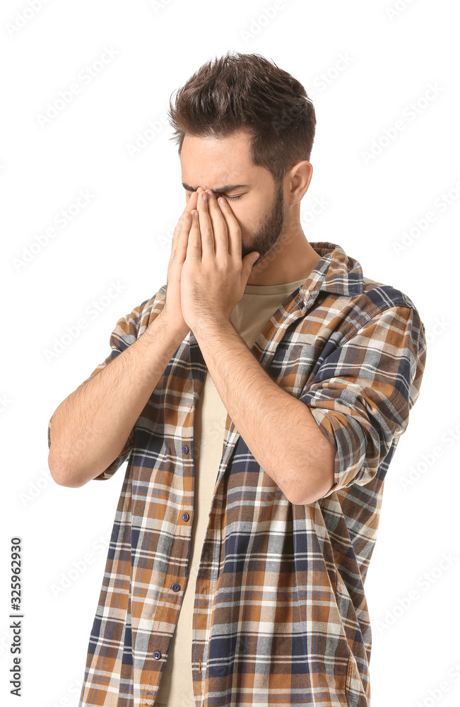 Portrait of worried young man on white background Portrait of worried young man on white background