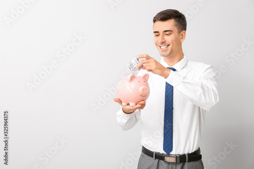 Handsome businessman with p...
