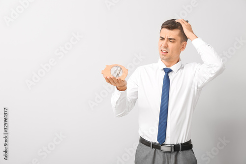 Thoughtful businessman with...