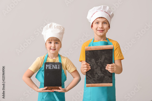 Cute little chefs with menu...