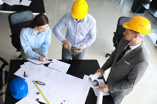 Group of engineers working ...