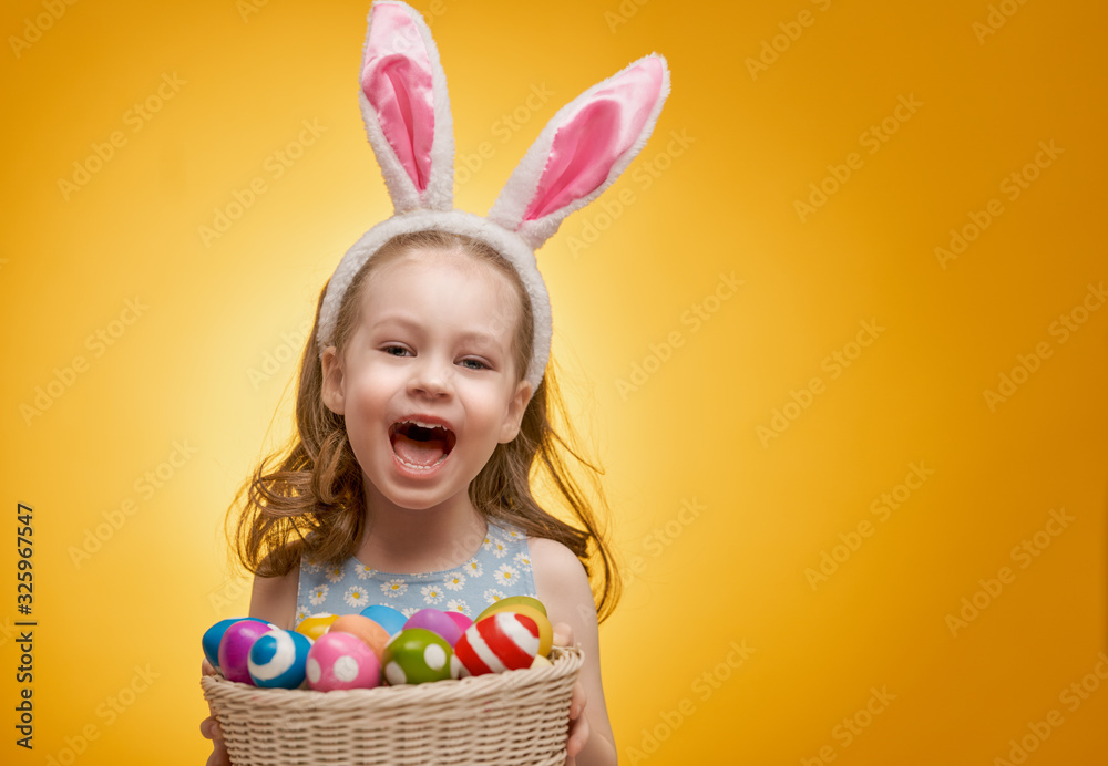 Girl with painted eggs
