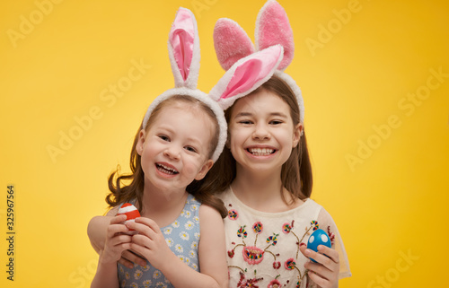 Girls with painted eggs