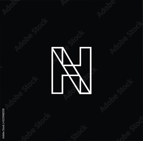 Minimal elegant monogram art logo. Outstanding professional trendy awesome artistic HN NH initial based Alphabet icon logo. Premium Business logo in White color on black background