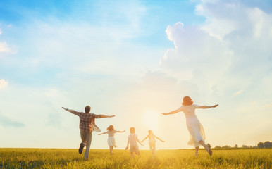 Happy family on summer walk